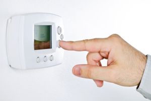 Hand setting digital thermostat